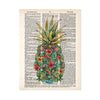 watercolor monstera leaves along with pink, red, peach, and blue flowers along with red and blue shells and coral form a pineapple shape with a traditional pineapple top printed on a dictionary page