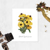 black eyed susan flowers on matte white paper with the words Black Eyed Susan at the bottom