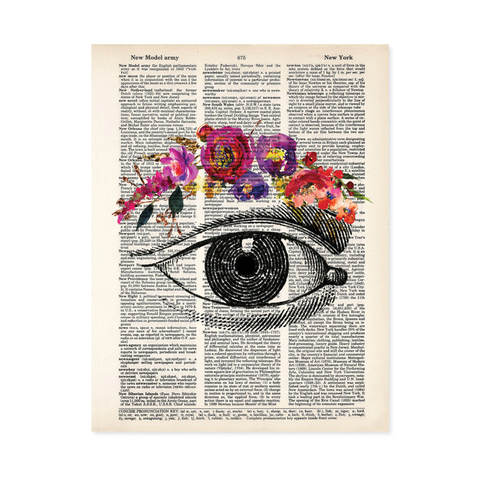 vintage eye etching with flowers for the eyebrow in pinks, purples, and red watercolors printed on a dictionary page