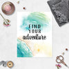 find your adventure in black in with a beachy waves and water scene and a single starfish on the beach printed on matte white paper