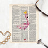 watercolor pink flamingo wearing a golden crown printed on salvaged dictionary paper