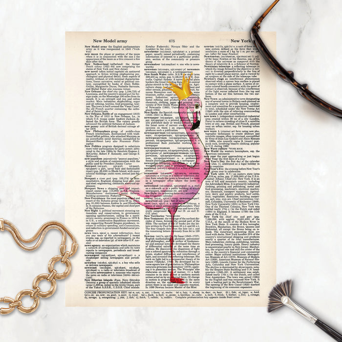 watercolor pink flamingo wearing a golden crown printed on salvaged dictionary paper