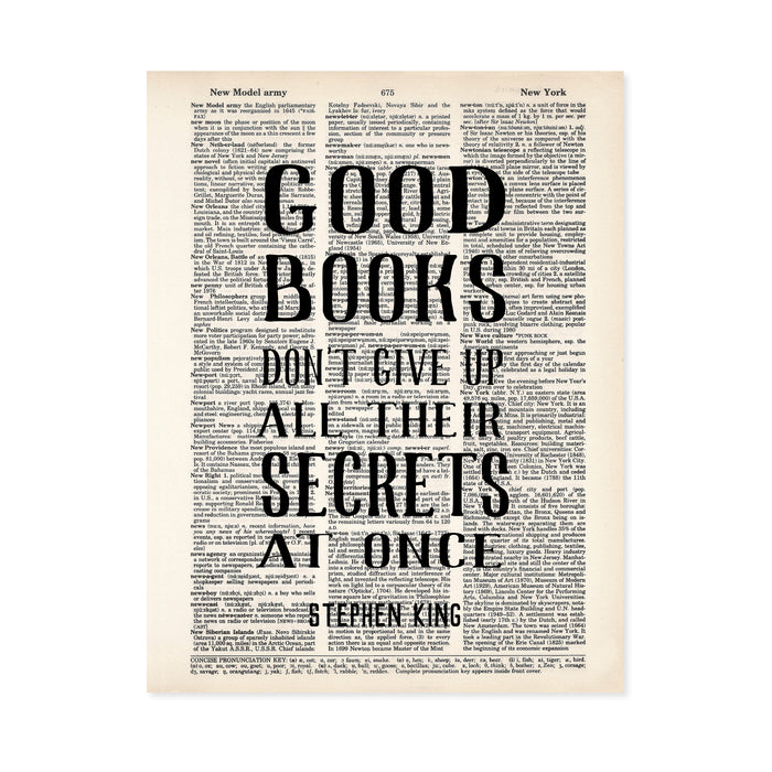 good books don't give up their secrets at once Stephen King quote printed on a dictionary page