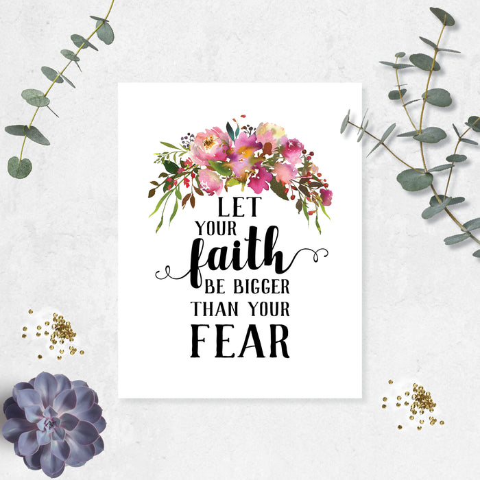 Let your faith be bigger than your fear with a spray of pink flowers with greenery at the top of the page printed on matte white paper