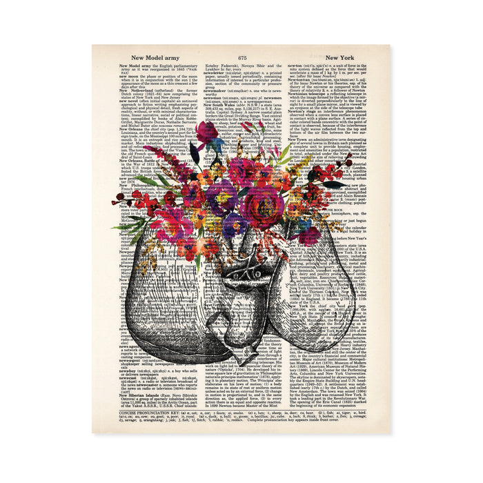 liver etching with watercolor flowers in pinks, purples, yellow and golden tones with greenery printed on a dictionary page