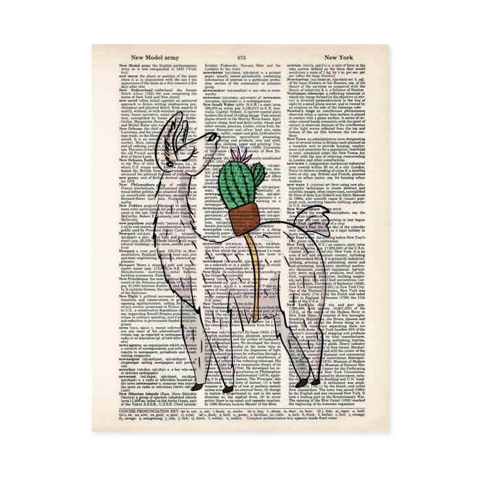 llama looking back over its shoulder at a potted cactus with a single flower strapped to its back printed on salvaged dictionary paper