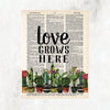 words love grows here in black ink above a row of potted cactus printed on a salvaged dictionary page 