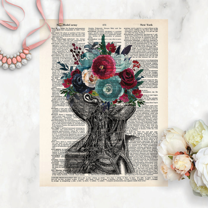 vintage neck etching with blue and berry red flowers printed on a dictionary page