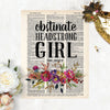 obstinate headstrong girl Jane Austen quote with watercolor flowers in pinks, purples, and golden tones with greenery printed on dictionary page