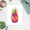 tropical pink watercolor flowers shaped to form a pineapple with a green pineapple top printed on matte white paper
