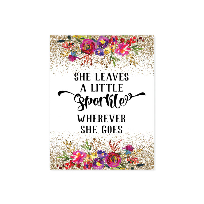 she leaves a little sparkle wherever she goes with top and bottom golden look sprinkles with flowers in pink, purple, yellow with greenery watercolors printed on matte white paper