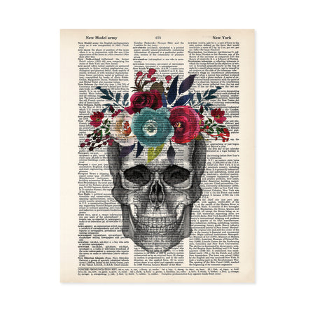 pencil sketch of a skull looking straight on topped with watercolor flowers in plue, pale pink, red, deep red and muted greenery on top printed on a dictionary page