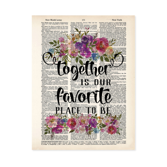 together is our favorite place to be with watercolor flowers in pinks, purples, blues with greenery top and bottom printed on a dictionary page